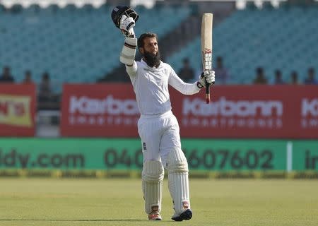 Cricket - India v England - First Test cricket match - Saurashtra Cricket Association Stadium, Rajkot, India - 10/11/16. England's Moeen Ali celebrates scoring his century. REUTERS/Amit Dave