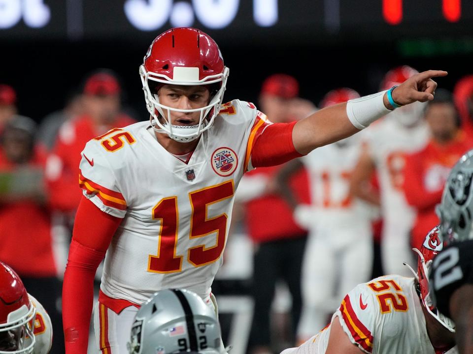 Patrick Mahomes signals to a teammate against the Las Vegas Raiders.