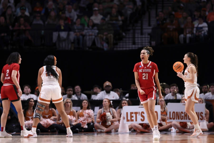 North Carolina State guard Madison Hayes (21) reacts during the second half of an Elite Eight college basketball game against Texas in the women’s NCAA Tournament, Sunday, March 31, 2024, in Portland, Ore. (AP Photo/Howard Lao)
