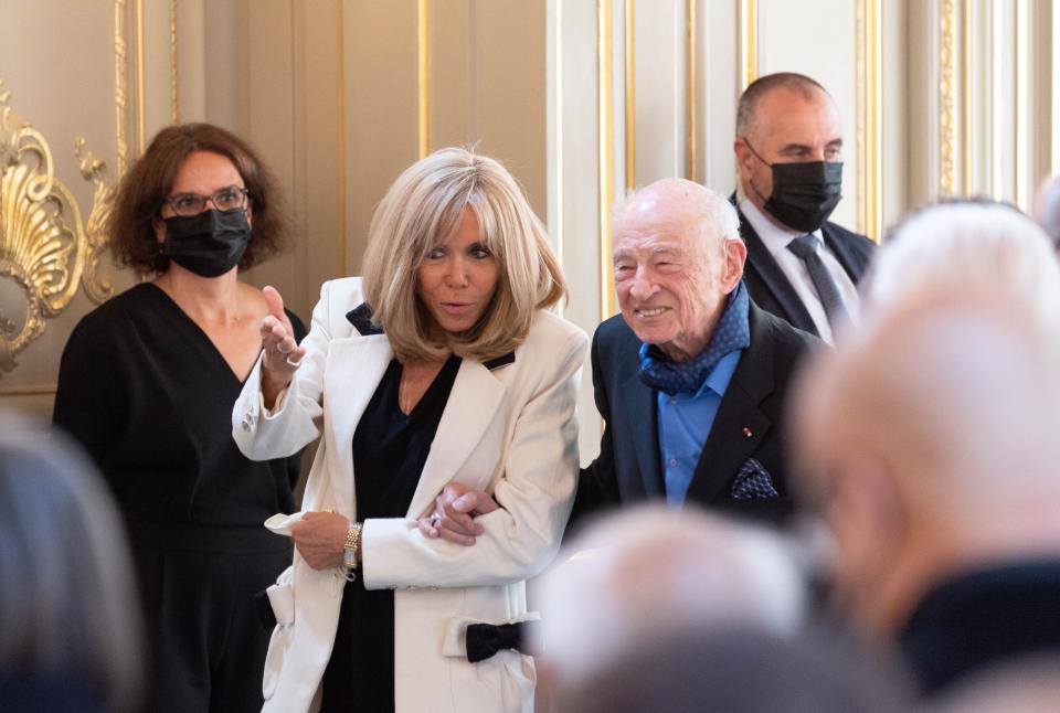 Brigitte Macron and Edgar Morin attend a ceremony to celebrate Morin’s 100th birthday at Elysee Palace in Paris. - Credit: Jacques Witt/SIPA
