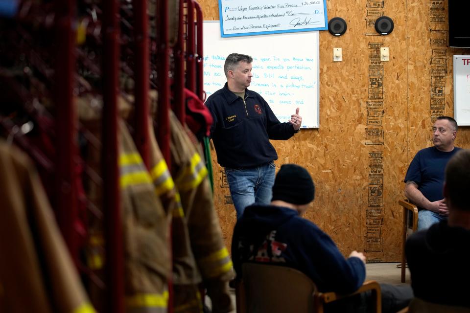 Chief Chris Wysong speaks during a meeting with volunteer firefighters at the Wayne Township Fire Department in Good Hope, Ohio.