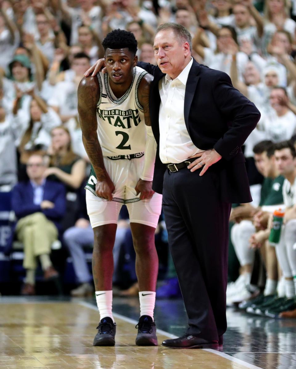 Michigan State coach Tom Izzo talks with guard Rocket Watts during the 80-69 win over Ohio State on Sunday, March 8, 2020, at the Breslin Center.