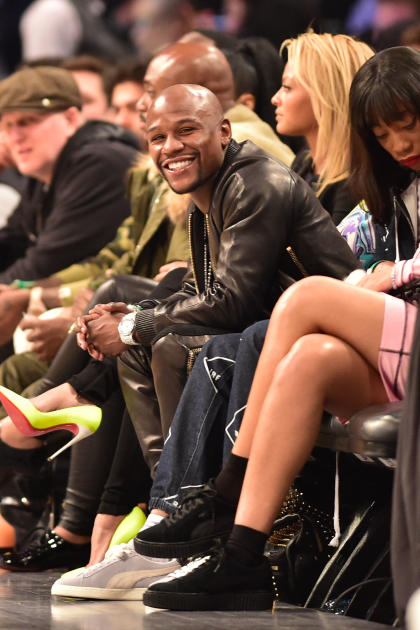 Floyd Mayweather watches the Three-Point Contest at All-Star Saturday Night. (USAT)