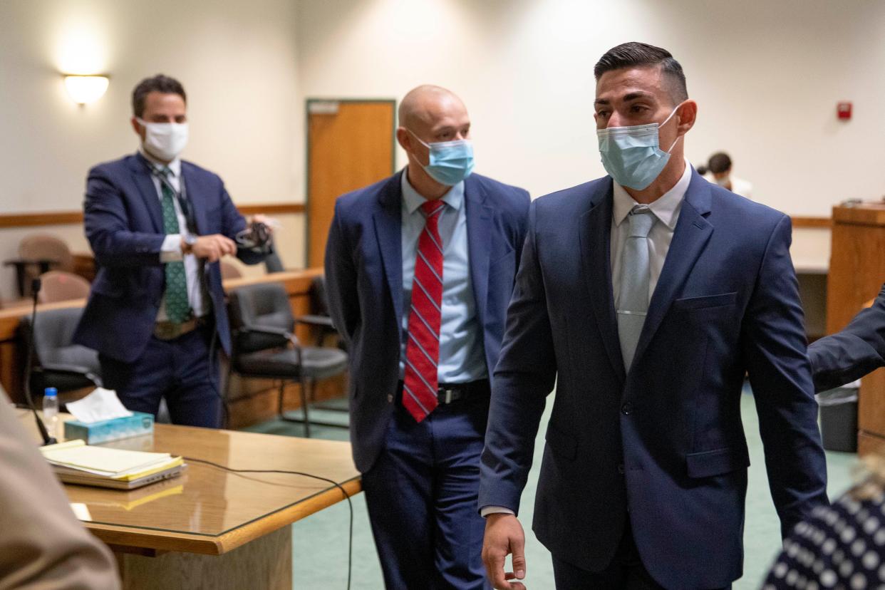 Former Las Cruces police officer Christopher Smelser leaves the courtroom with tears in his eyes after Judge Douglas Driggers dismissed a second-degree murder charge against him Thursday, July 14, 2022.