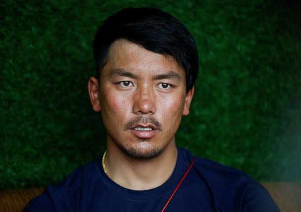 PHOTO: Ngima Tashi Sherpa, who rescued a Malaysian climber from the death zone above camp four, speaks during an interview with Reuters in Kathmandu, Nepal, May 31, 2023. (Navesh Chitrakar/Reuters)