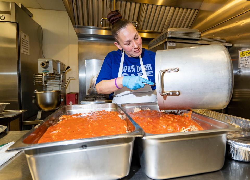 Lauren Baas, Open Door Café Head Cook, prepares spaghetti for the free hot lunch program at the Cathedral of St. John the Evangelist on Thursday April 4, 2024 in Milwaukee, Wis.