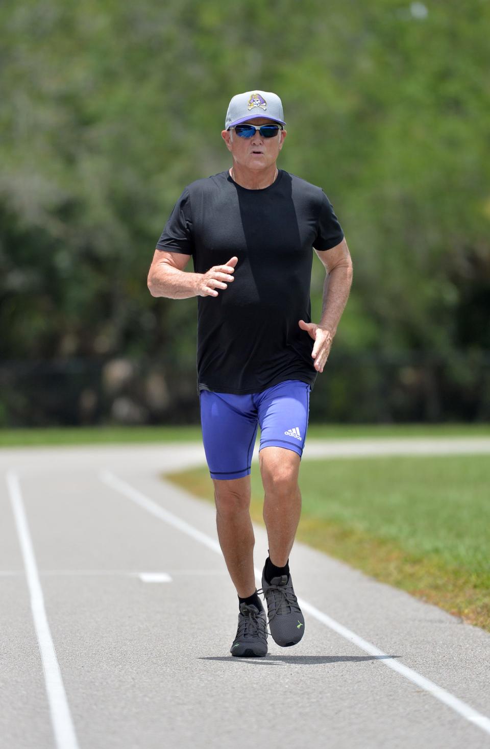 Mike Lynch, 73, works out recently at the track at Pine View School in Osprey, Florida.