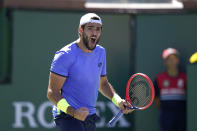 Matteo Berrettini, of Italy, reacts after beating Alejandro Tabilo, of Chile, in a match at the BNP Paribas Open tennis tournament Sunday, Oct. 10, 2021, in Indian Wells, Calif. (AP Photo/Mark J. Terrill)