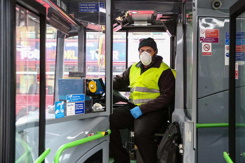 LONDON, ENGLAND - APRIL 18: Bus driver Am Saleem poses for a portrait in Bow on April 18, 2020 in London, England. In a press conference on Thursday, First Secretary of State Dominic Raab announced that the lockdown will remain in place for at least 3 more weeks. The Coronavirus (COVID-19) pandemic has spread to many countries across the world, claiming over 140,000 lives and infecting more than 2 million people. (Photo by Hollie Adams/Getty Images)