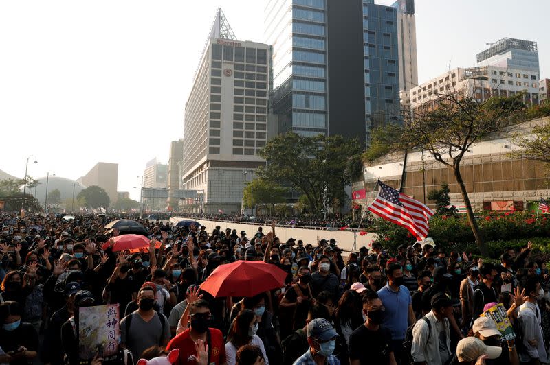 Anti-government protesters attend the "Lest We Forget" rally in Hong Kong