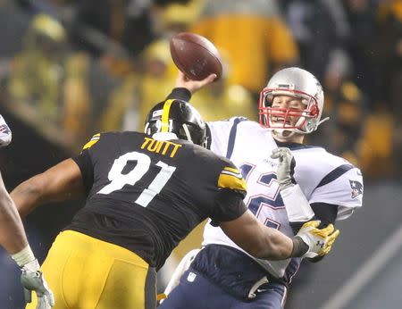 Dec 17, 2017; Pittsburgh, PA, USA; Pittsburgh Steelers defensive end Stephon Tuitt (91) pressures New England Patriots quarterback Tom Brady (12) during the third quarter at Heinz Field. The Patriots won 27-24. Mandatory Credit: Charles LeClaire-USA TODAY Sports