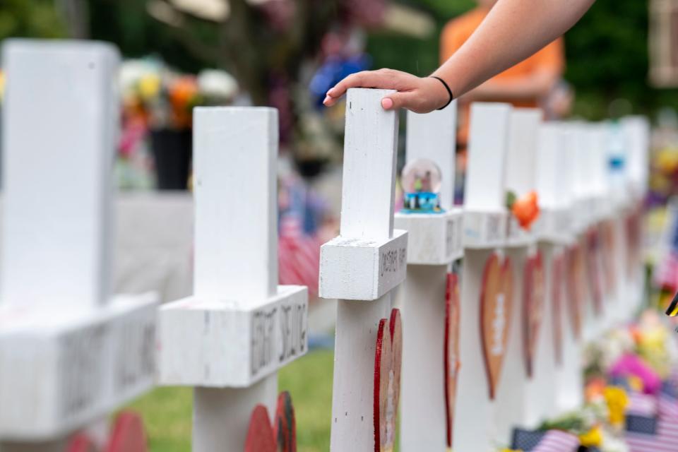 Mourners paid respects in June at a Virginia Beach memorial for victims of a mass shooting that killed twelve people.