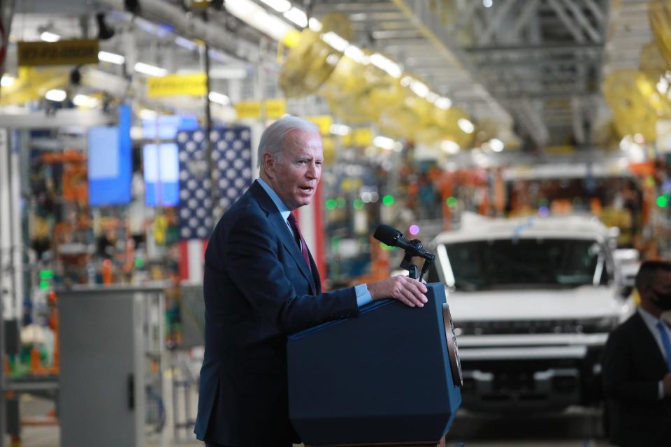 Chevrolet Bolt EV sits on display before U.S. President Joe Biden speaks at the grand opening of General Motor's Detroit-Hamtramck EV Factory Zero on Nov. 17, 2021.  The president added $7.5 billion to create new electric vehicle charging stations as part of his infrastructure package recently passed by Congress and signed into law on Monday.