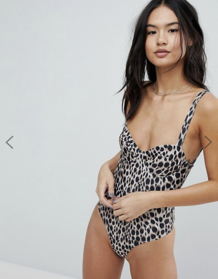 A photo of a model wearing Motel Leopard Print Swimsuit.