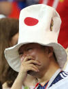 <p>Japan fan looks dejected after the match REUTERS/Marko Djurica </p>