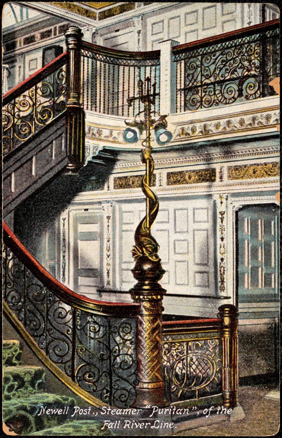 A postcard depicts a luxurious stairway inside the Fall River Line passenger steamship Puritan.