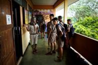 Teeraphong Meesat, 29, known as teacher Bally speaks to students before his English class at the Prasartratprachakit School in Ratchaburi Province