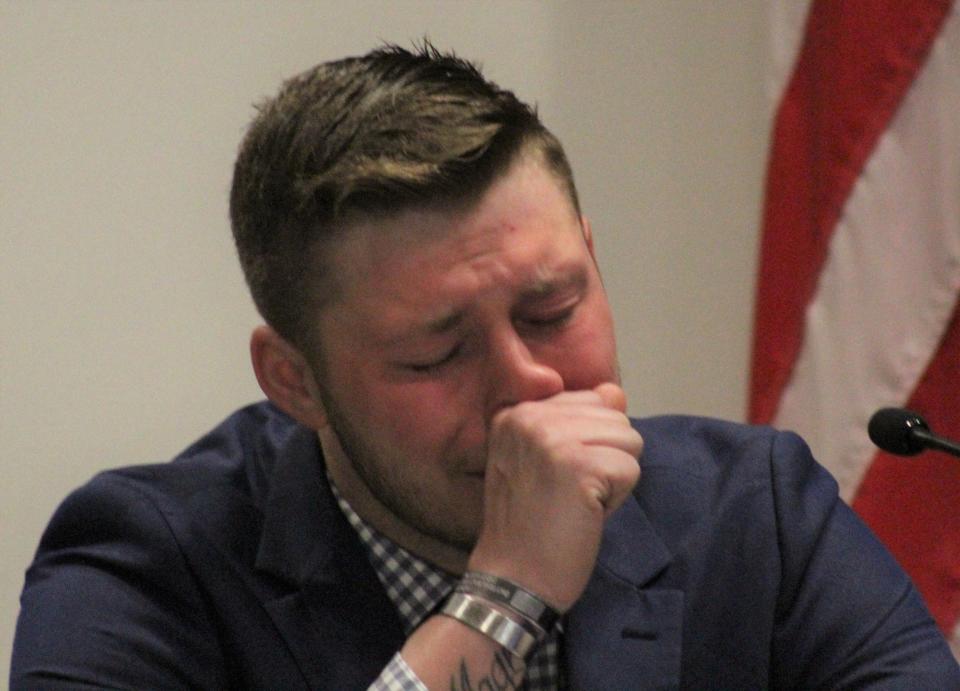 Former Daytona Beach Police Officer Brandon Michael Fox becomes emotional Wednesday as he testifies during his sentencing for possession of child sexual abuse material.