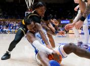 Duke’s Mark Mitchell and La Salle’s Khalil Brantley battle for possession during the first half of the Blue Devils’ game on Tuesday, Nov. 21, 2023, at Cameron Indoor Stadium in Durham, N.C.
