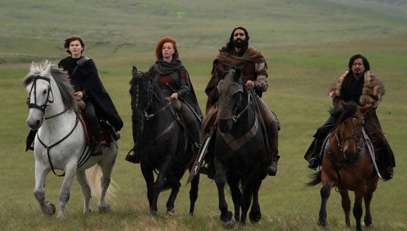 four characters on horses