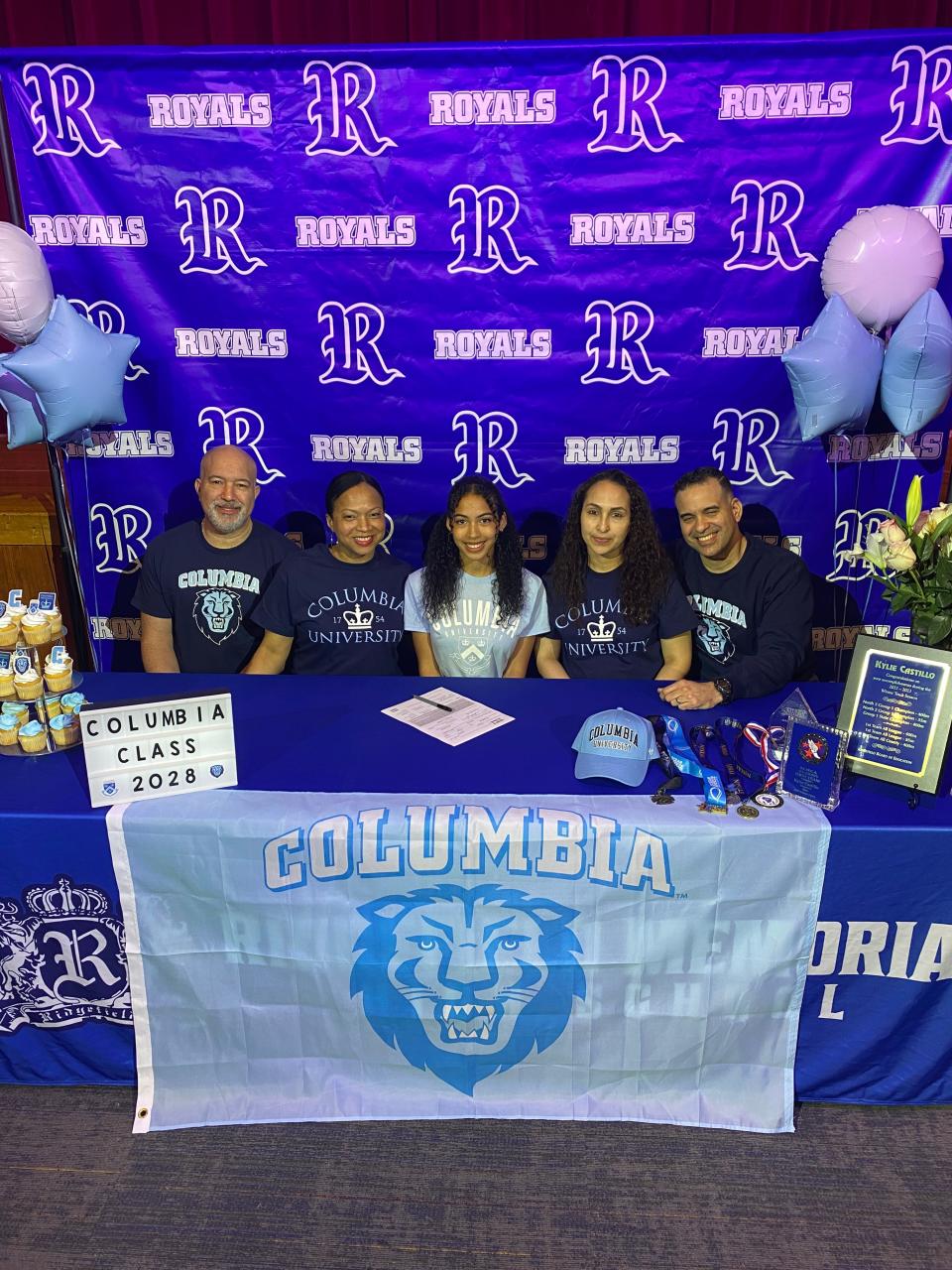 Ridgefield senior Kylie Castillo signed her letter of intent for Columbia University. She is joined by Cesar Heyaime, Audrey Young, Jessie Acevedo and Robin Castillo.