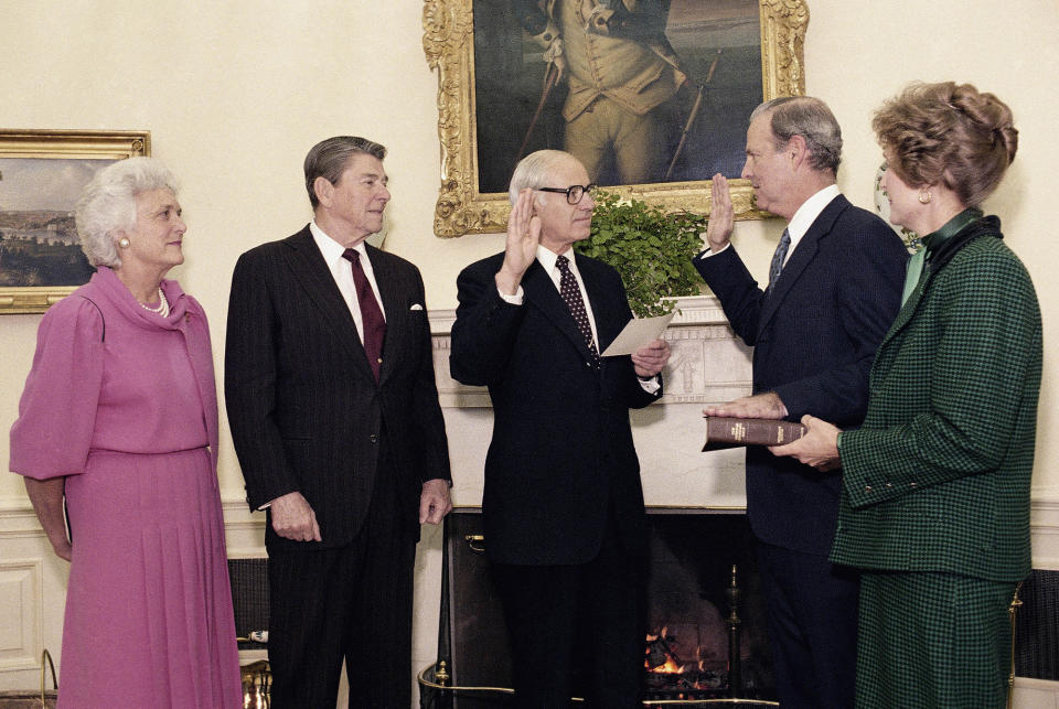 Baker is sworn in as Treasury secretary at the White House in February 1985.