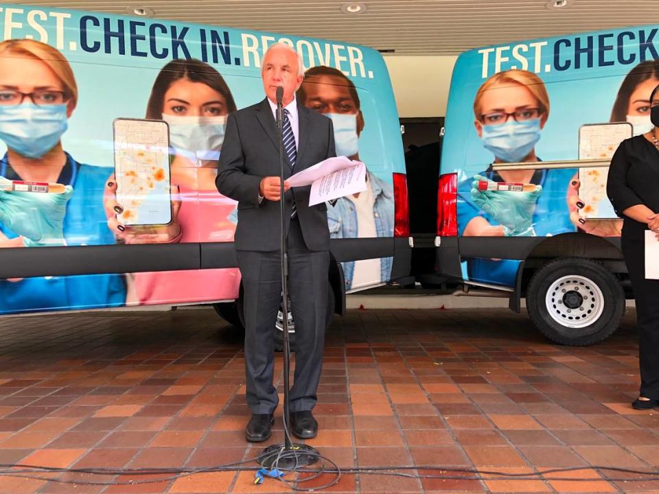 Miami-Dade Mayor Carlos Gimenez announces plans to reopen movie theaters and other entertainment venues during a press conference at the Stephen P. Clark Center in downtown Miami on Wednesday, Sept. 16, 2020.