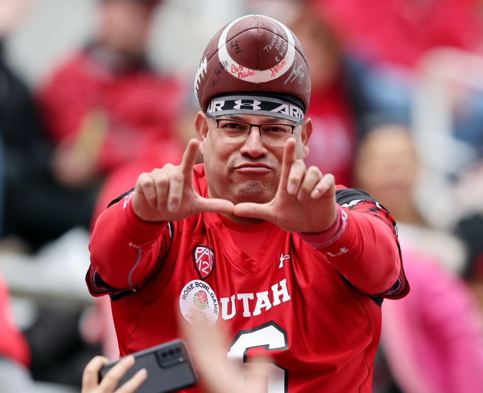 A fan holds up his “U” as The University of Utah football team plays in the 22 Forever Game at Rice Eccles Stadium in Salt Lake City on Saturday, April 22, 2023. the white team won 38-28 over red. | Scott G Winterton, Deseret News