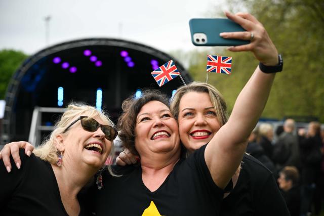 People take selfies at The Big Lunch at The Long Walk during the Coronation (Getty Images)