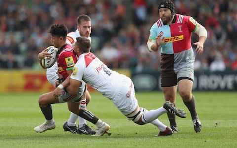 Mike Williams tackles Marcus Smith - Credit: Getty Images