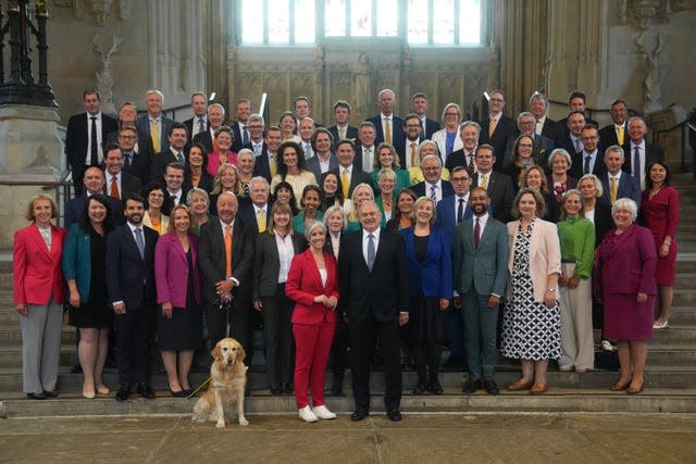 Lib Dem MPs posing for group photo in Parliament