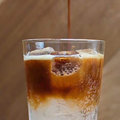 <p>Pour a shot of espresso over tonic water on ice for an effervescently refreshing iced coffee.</p><p>Get the tutorial from <a href="http://www.tastingtable.com/entry_detail/national/17507/Coffee_Tonics_Are_the_New_Iced_Coffee.htm" rel="nofollow noopener" target="_blank" data-ylk="slk:Tasting Table;elm:context_link;itc:0;sec:content-canvas" class="link ">Tasting Table</a>.</p>