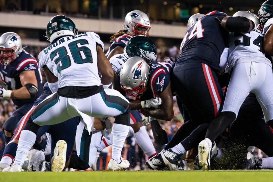 Aug 19, 2021; Philadelphia, Pennsylvania, USA; New England Patriots running back Rhamondre Stevenson (38) scores a touchdown against the Philadelphia Eagles during the third quarter at Lincoln Financial Field.