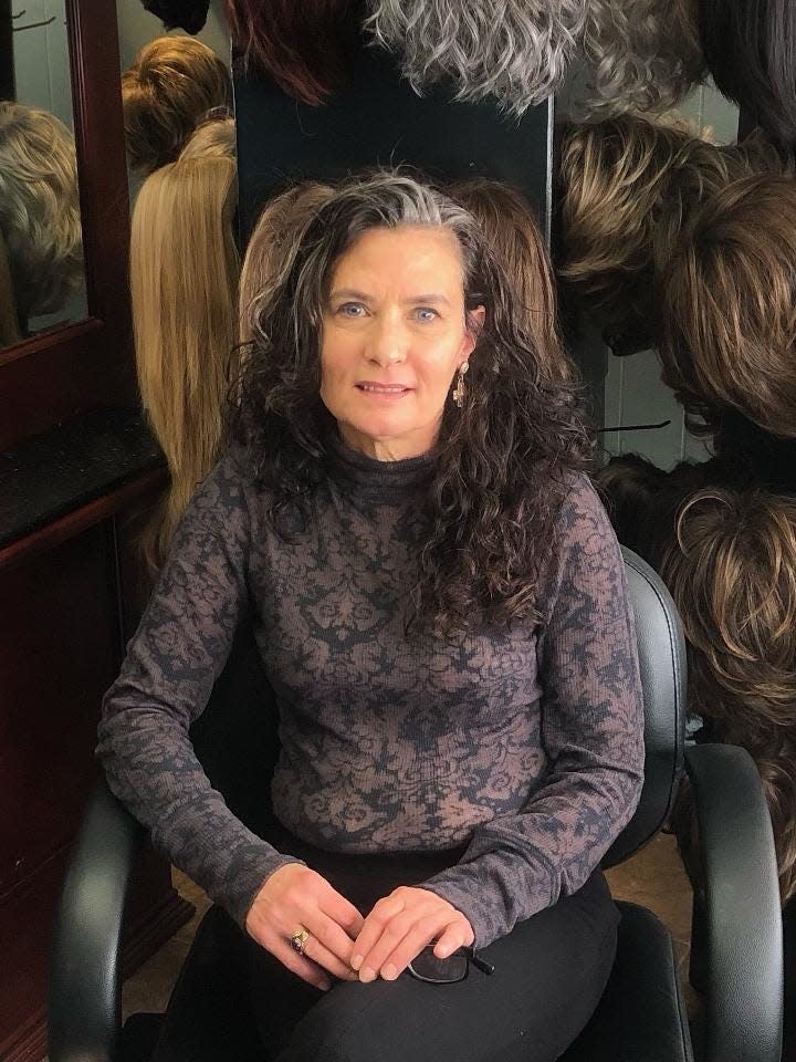 Lisa Brzezinski, founder and owner of Naturally You Wigs in Menomonee Falls, has been fitting wigs for people who experienced hair loss due to COVID-19.