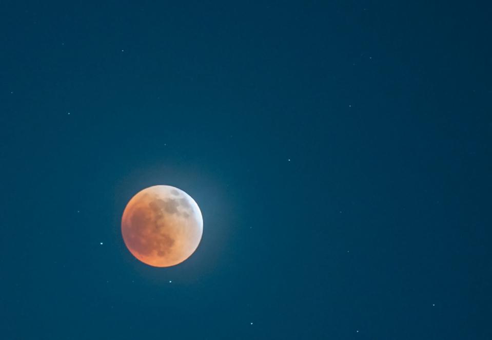 The super flower blood moon eclipse seen Sunday from Wichita Falls. When the moon was fully eclipsed, there was a reddish hue because the only light available was bend through the Earth's atmosphere.