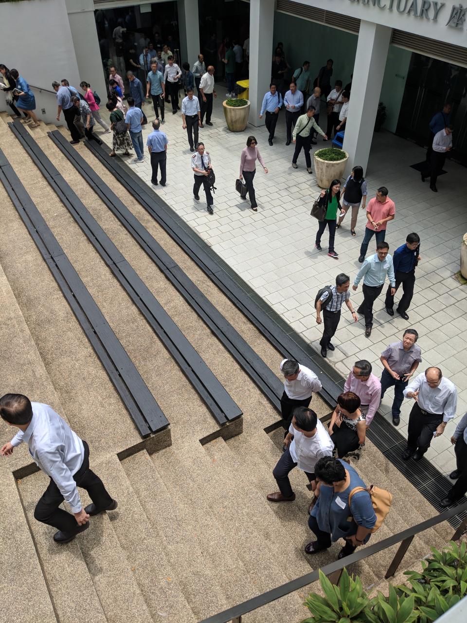 Attendees leaving the closed-door briefing at the <span>St Andrew Cathedral Prayer Halls </span>on 18 September, 2018. (PHOTO: Yahoo News Singapore)