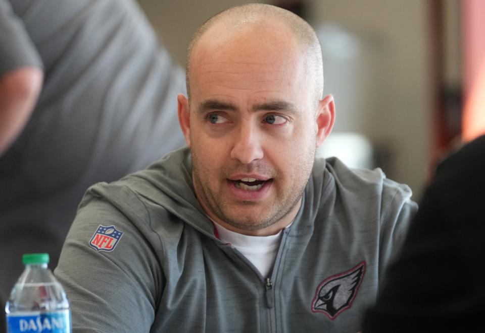 Arizona Cardinals offensive coordinator Drew Petzing speaks with the media as new coaching staff hires are introduced at the Arizona Cardinals facility in Tempe on March 8, 2023.