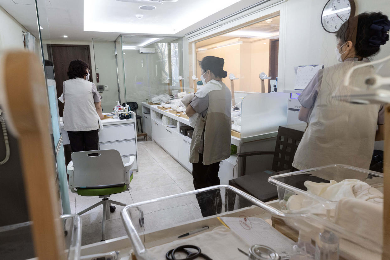 Staff take care of newborns at St. Park, a postpartum care center, or sanhujoriwon, in Seoul, South Korea, Jan. 15, 2024. <span class="copyright">Jean Chung—The New York Times/Redux</span>
