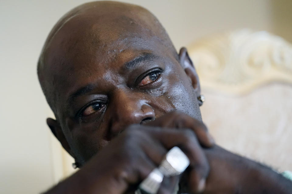 FILE - Aaron Larry Bowman cries during an interview at his attorney's office in Monroe, La., Aug. 5, 2021, as he discusses his injuries resulting from a Louisiana State trooper pummeling him during a traffic stop in 2019. A federal jury in Louisiana on Wednesday, Aug. 2, 2023, acquitted a white state trooper charged with violating the civil rights of Bowman despite body camera footage that captured the officer pummeling him 18 times with a flashlight. (AP Photo/Rogelio V. Solis, File)