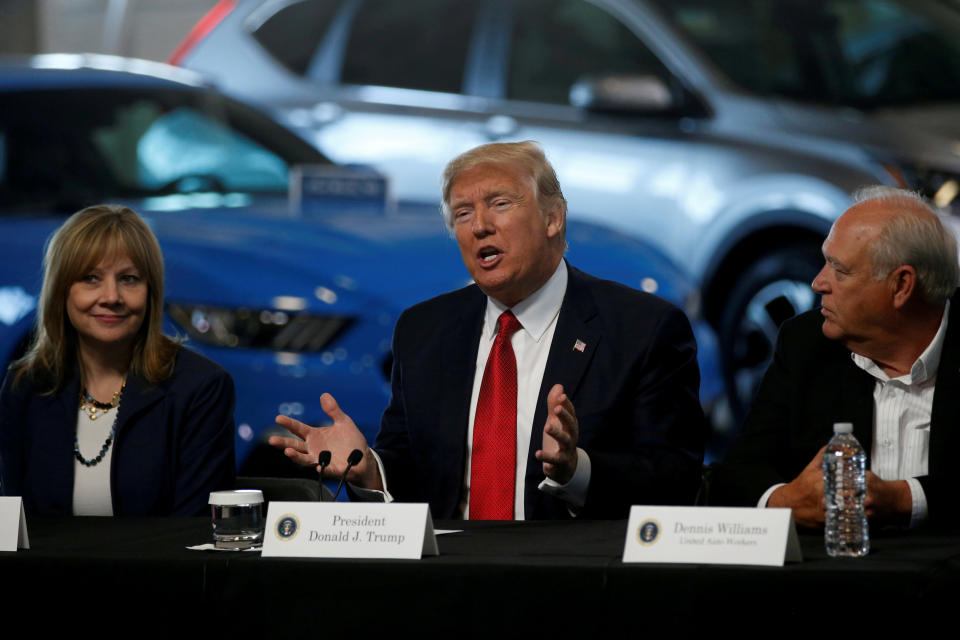 U.S. President Donald Trump talks with auto industry leaders on March 15, 2017. REUTERS/Jonathan Ernst/File Photo