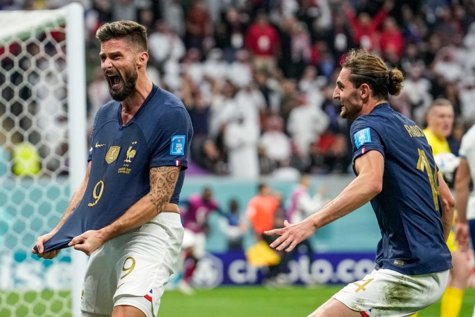 Olivier Giroud celebrates scoring for France (AP)