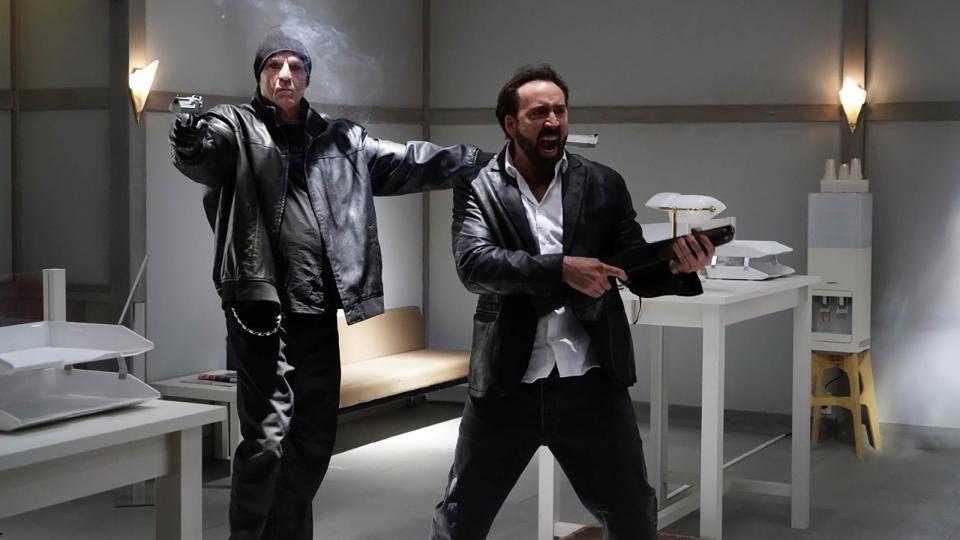Nick Cassavetes (left) and Nicolas Cage plays a couple of notorious criminals who hold up a bank in the gonzo action thriller "Prisoners of the Ghostland."
