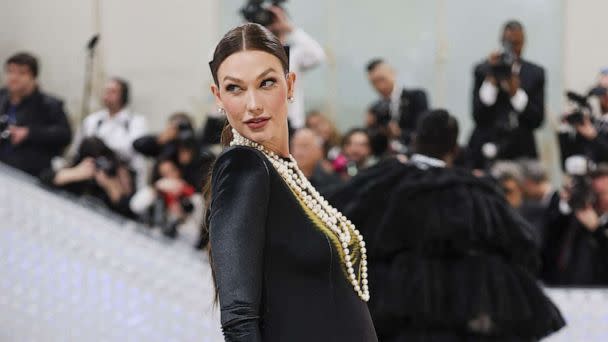 PHOTO: Karlie Kloss poses at the Met Gala, an annual fundraising gala held for the benefit of the Metropolitan Museum of Art's Costume Institute with this year's theme 'Karl Lagerfeld: A Line of Beauty', in New York, May 1, 2023. (Andrew Kelly/Reuters)