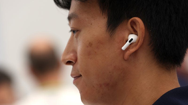 An attendee wears new AirPods Pro during an Apple special event on September 07, 2022 in Cupertino, California. 