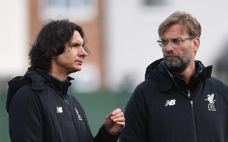 Zeljko Buvac speaks with Jurgen Klopp ahead of Liverpool’s 5-2 victory over Roma in the Champions League