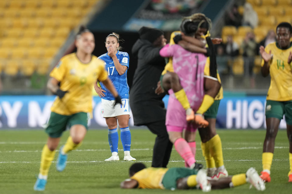 Italy's Lisa Boattin looks on as South Africa players celebrate after the Women's World Cup Group G soccer match between South Africa and Italy in Wellington, New Zealand, Wednesday, Aug. 2, 2023. (AP Photo/Alessandra Tarantino)
