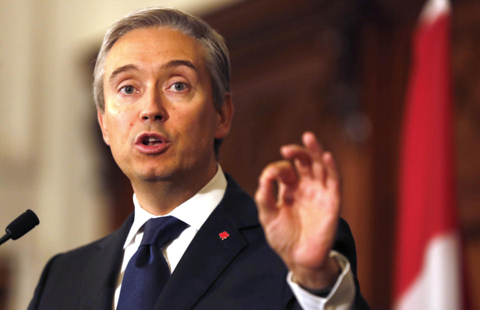 Francois-Philippe Champagne, Canada Minister of Foreign Affairs, speaks during a press conference after a meeting of the International Coordination and Response Group for the families of the victims of PS752 flight that crashed shortly after taking off from the Iranian capital Tehran on Jan. 8, killing all 176 passengers and crew on board. (AP Photo/Frank Augstein)