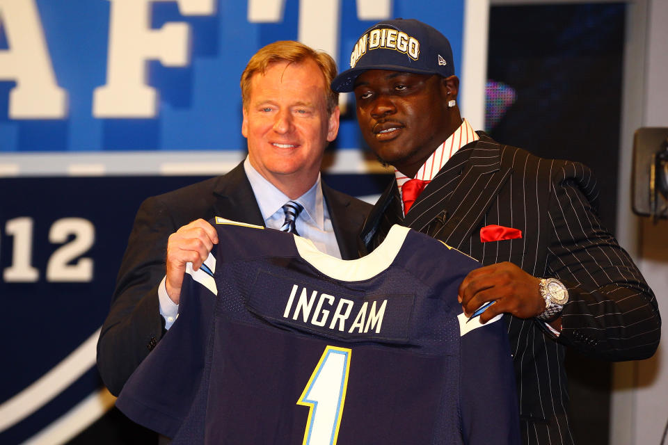 NEW YORK, NY - APRIL 26: Melvin Ingram of South Carolina holds up a jersey as he stands on stage with NFL Commissioner Roger Goodell after he was selected #18 overall by the San Diego Chargers in the first round of the 2012 NFL Draft at Radio City Music Hall on April 26, 2012 in New York City. (Photo by Al Bello/Getty Images)