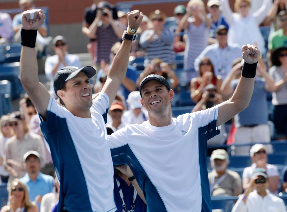 Mike Bryan and Bob Bryan after winning the men's doubles title at the 2014 U.S. Open.