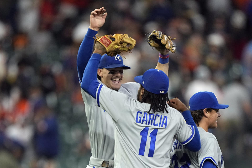 Kansas City Royals' Maikel Garcia (11) and Bobby Witt Jr. celebrate after a baseball game against the Houston Astros Saturday, Sept. 23, 2023, in Houston. The Royals won 3-2. (AP Photo/David J. Phillip)